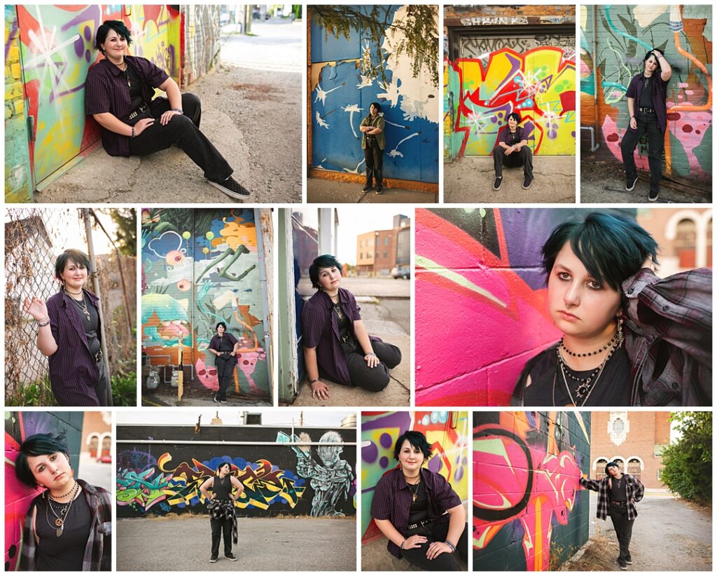 Indiana High School Senior with short teal and dark green hair wearing a purple pinstripe shirt and matching vest over black pants, photographed against layered graffiti murals in Fountain Square, sitting against a chain-link fence in one image and standing beneath colorful spray-painted doors in another, during their senior photoshoot with Amanda Duncan Photography in Indianapolis.
