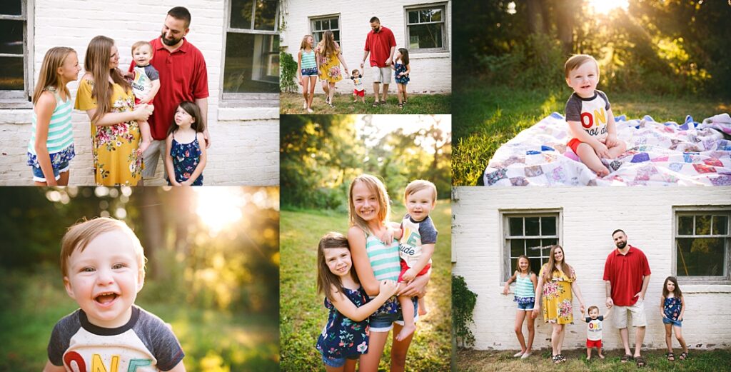 A mother in a mustard floral dress laughs with her baby boy in front of a white brick farmhouse to open this first birthday family photoshoot at Glenns Valley Nature Park, her daughters in coordinating teal stripes and navy florals close by. The collage includes the birthday boy grinning on a patchwork quilt in his "ONE" shirt, a big sister carrying her little brother across the sunlit lawn, and the whole family walking hand in hand toward the farmhouse at golden hour. Amanda Duncan Photography photographed this family milestone session at Glenns Valley Nature Park on the south side of Indianapolis, a charming Indianapolis-area location with a historic farmhouse backdrop perfect for first birthday photos.