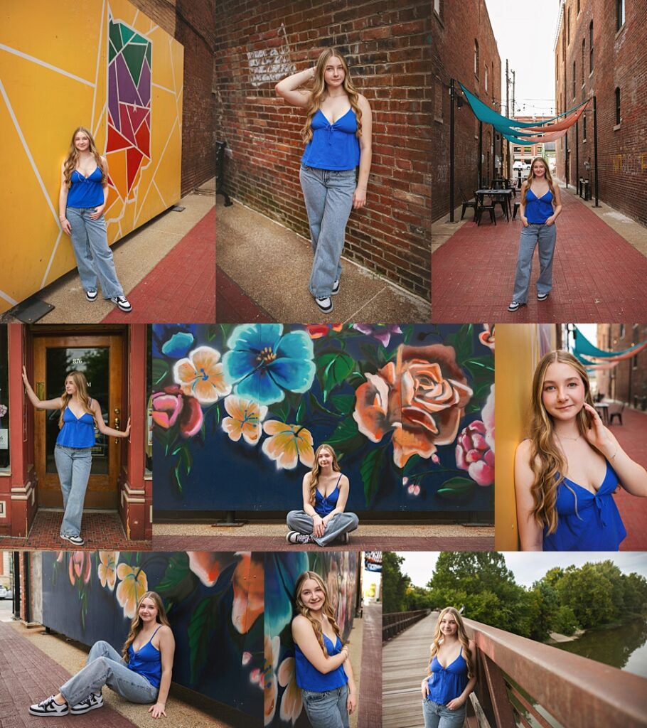 A high school senior in a blue tie-front top and light wash jeans poses against a bright yellow mural in downtown Noblesville, her long wavy hair falling over one shoulder. The collage carries her through a brick-lined alley strung with colorful fabric canopies, in front of a hand-painted floral mural where she sits cross-legged on the pavement, and finally onto a wooden bridge overlooking the river at the edge of town. Amanda Duncan Photography photographed this senior portrait session in downtown Noblesville, Indiana, a favorite Indianapolis-area location for senior pictures thanks to its colorful murals and historic brick alleyways.